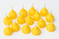 Handcrafted Modak-Shaped Decorative Candles – Festive Yellow Glow 10 piecs